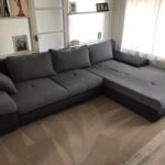 This is a photo of a grey L shape sofa that has been professionally steam cleaned, also the beige carpets have been steam cleaned too works carried out by Mill Hill Carpet Cleaning.